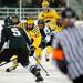 Michigan sophomore left wingman Alex Guptill skates with the puck on Friday. Daniel Brenner I AnnArbor.com